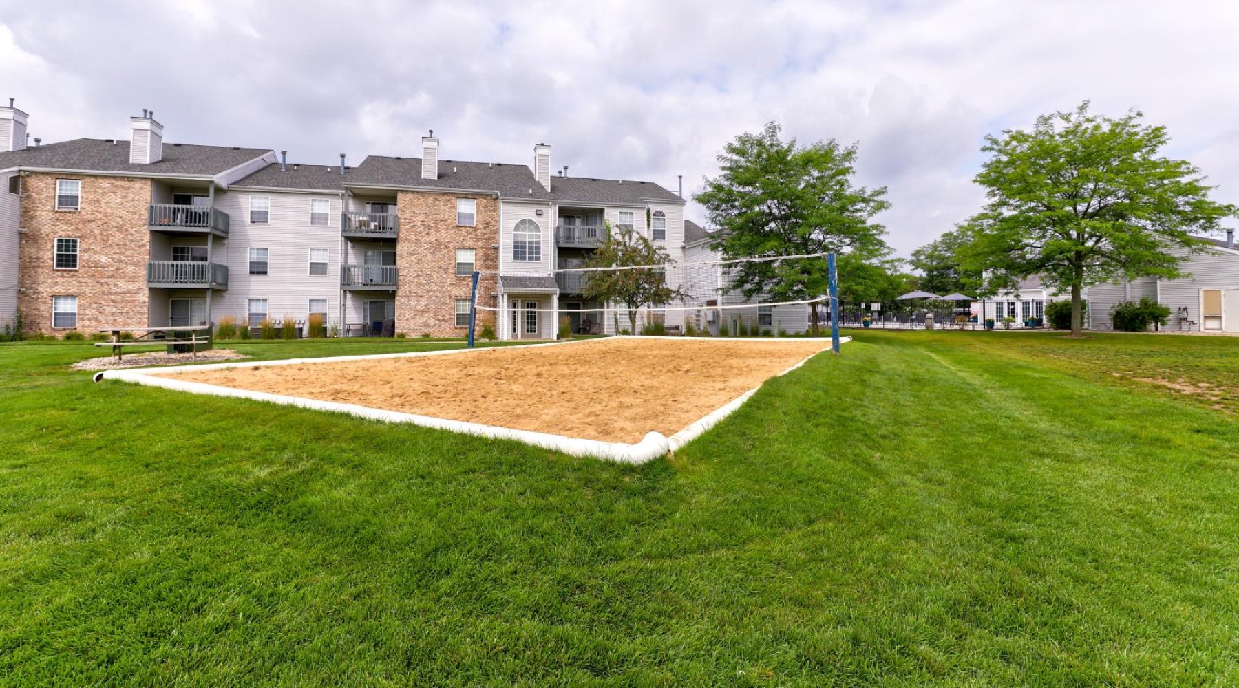 a large building with volleyball court