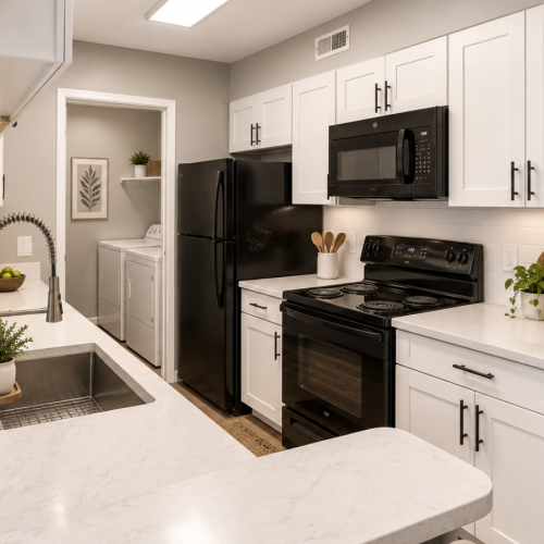 white cabinets and black appliance