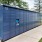 a blue locker hub on a sidewalk