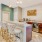 a kitchen with a marble island